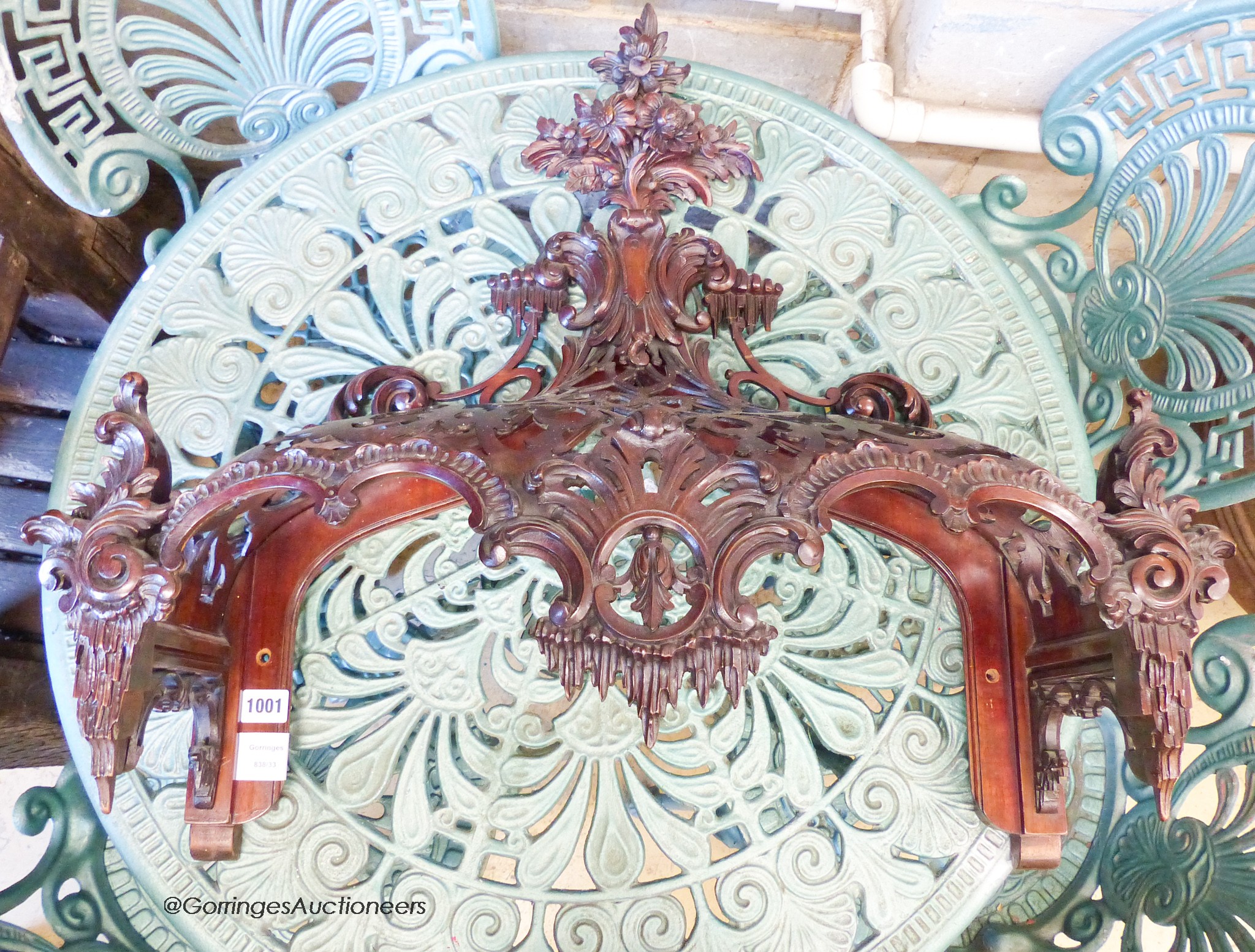 A carved mahogany bed canopy in the style of Thomas Chippendale, W.61cm H.63cm